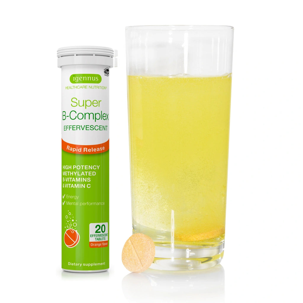 Supplement bottle labeled 'Super B-Complex' next to a glass of effervescent tablet