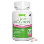A white bottle of Igennus Super B12-Complex dietary supplement with a white cap, shown on a white background with four pinkish-beige tablets placed in front of the bottle.