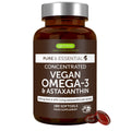 A brown amber bottle of Igennus Healthcare Nutrition Vegan Omega-3 & Astaxanthin softgels with a silver cap, shown on a white background with two red softgels in front.