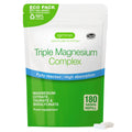 Igennus Healthcare Nutrition Triple Magnesium Complex in a white and green stand-up pouch with a blue band, shown on a white background with two white tablets in front.