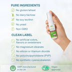 A hand holding a small white spray bottle labeled 'Celiac Friendly' against a light background, with text listing pure ingredients and clean label benefits, plus GMP and vegan approval badges at the bottom.