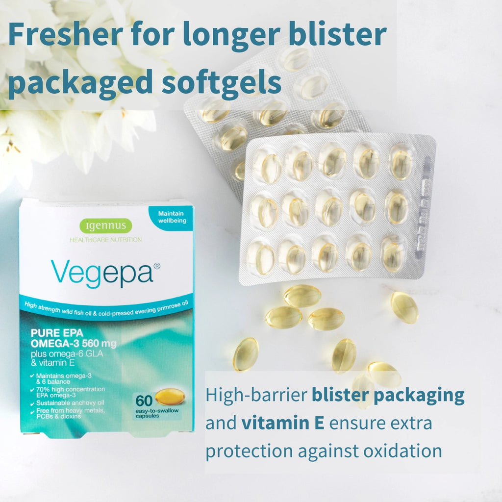 Vegepa supplement packaging with blister packs and pills on a light background